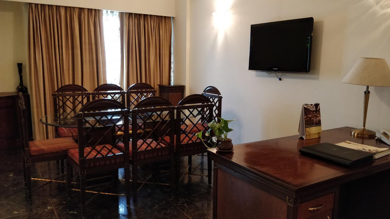 The Suryaa New Delhi Hotel Kültér fotó A meeting room at the hotel