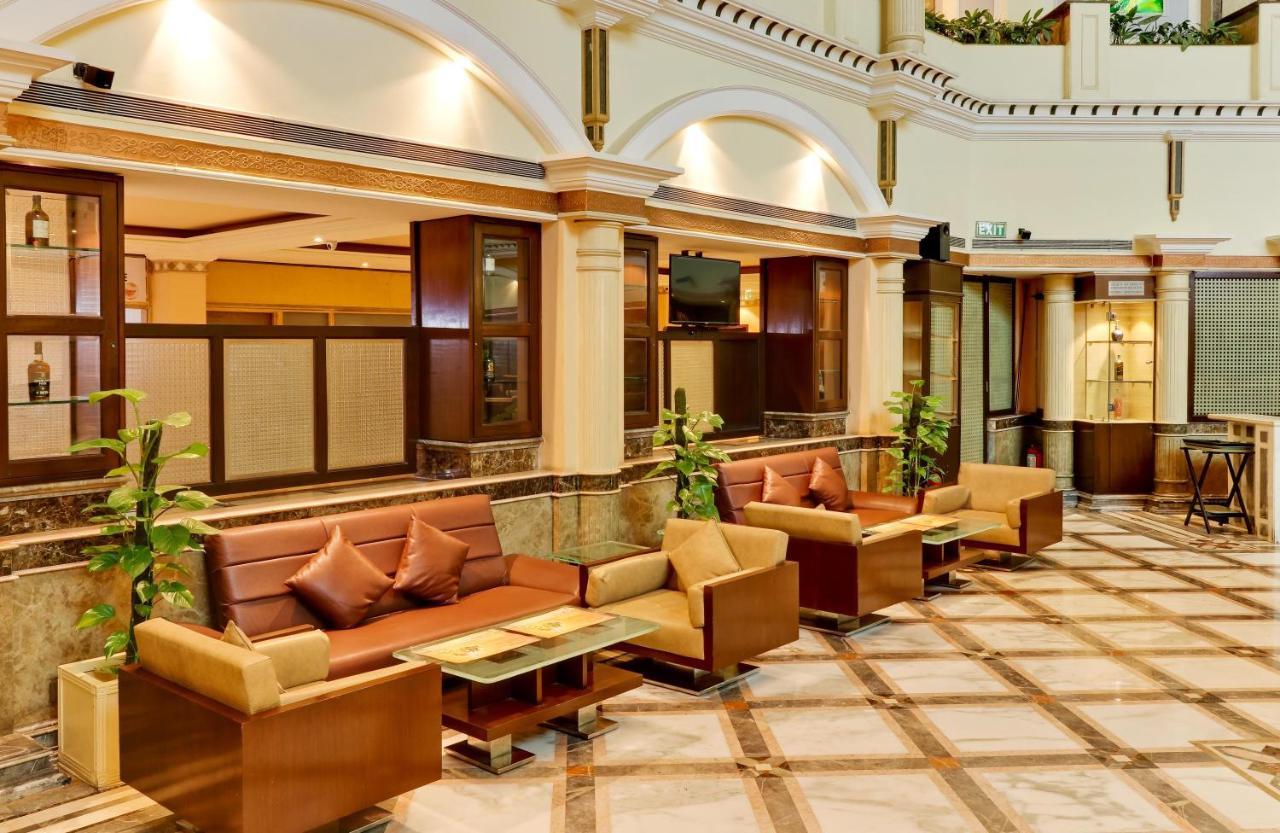 The Suryaa New Delhi Hotel Kültér fotó The lobby of the hotel
