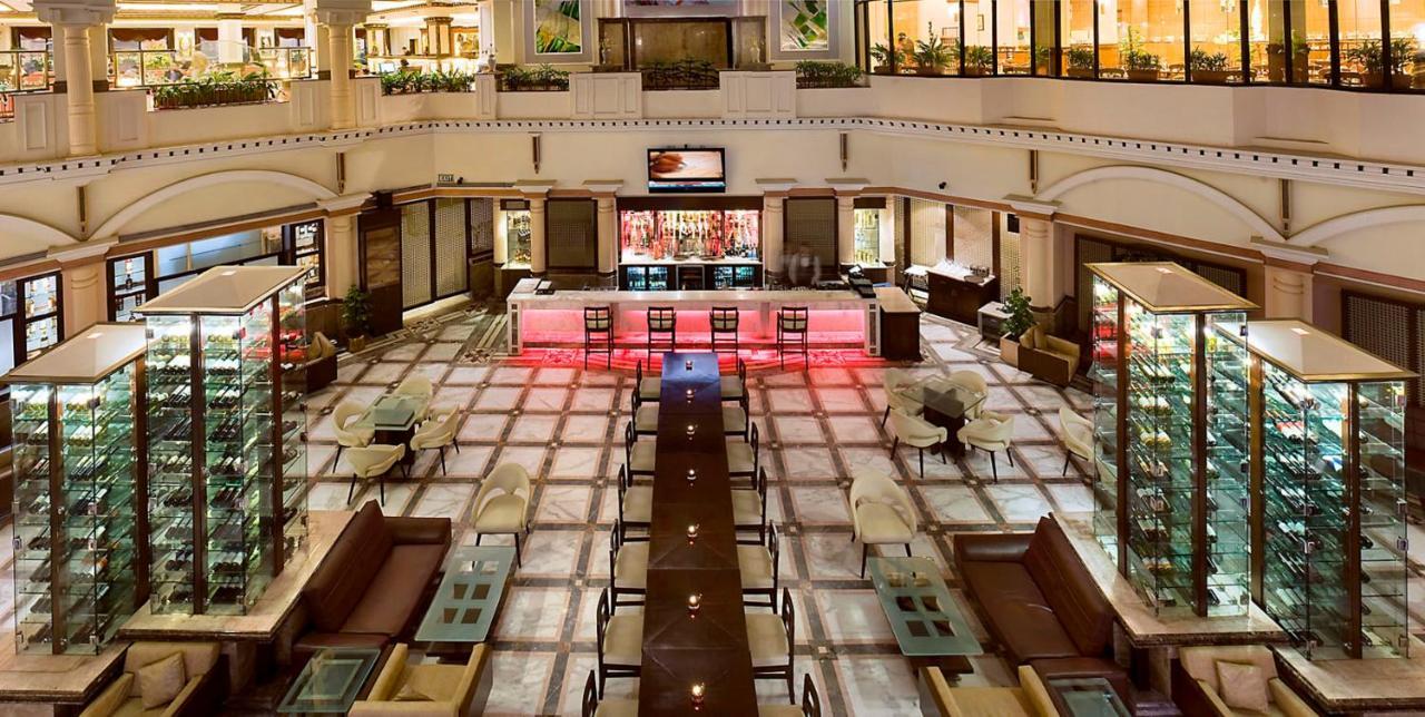 The Suryaa New Delhi Hotel Kültér fotó The lobby of the hotel